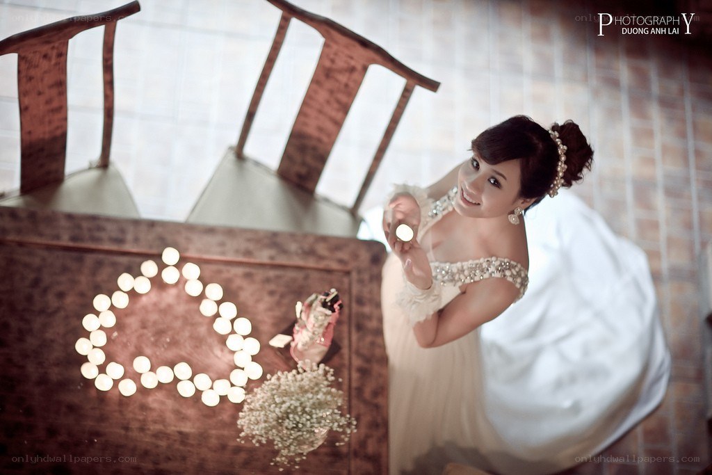 Bride with candles in heart shape