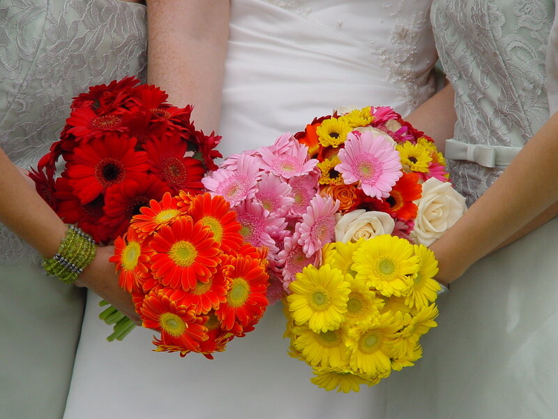 Brides with colorful bouquets