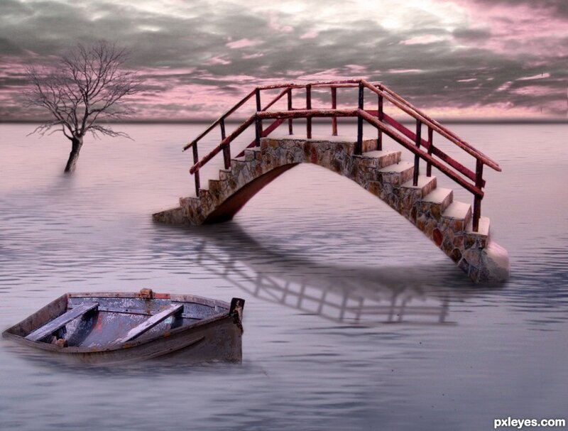 Bridge and boat in flooded landscape
