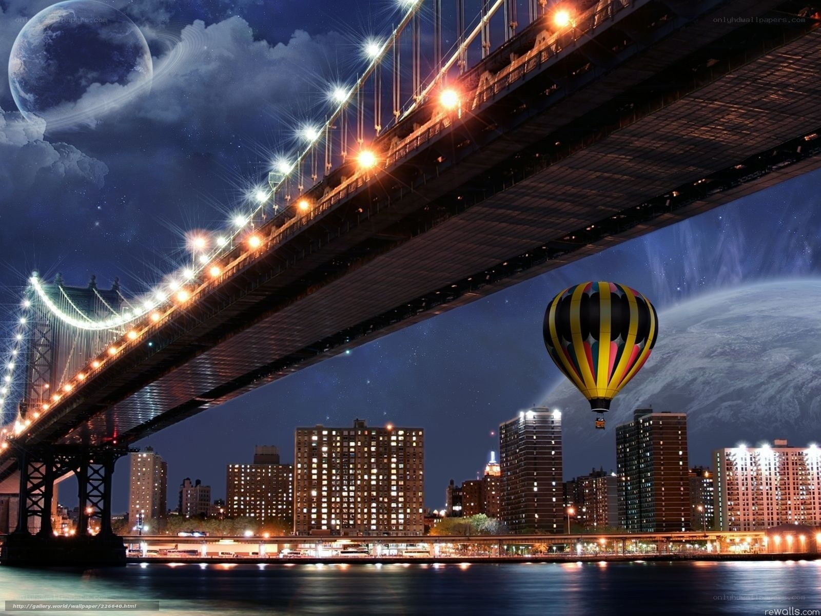 Bridge and hot air balloon at night