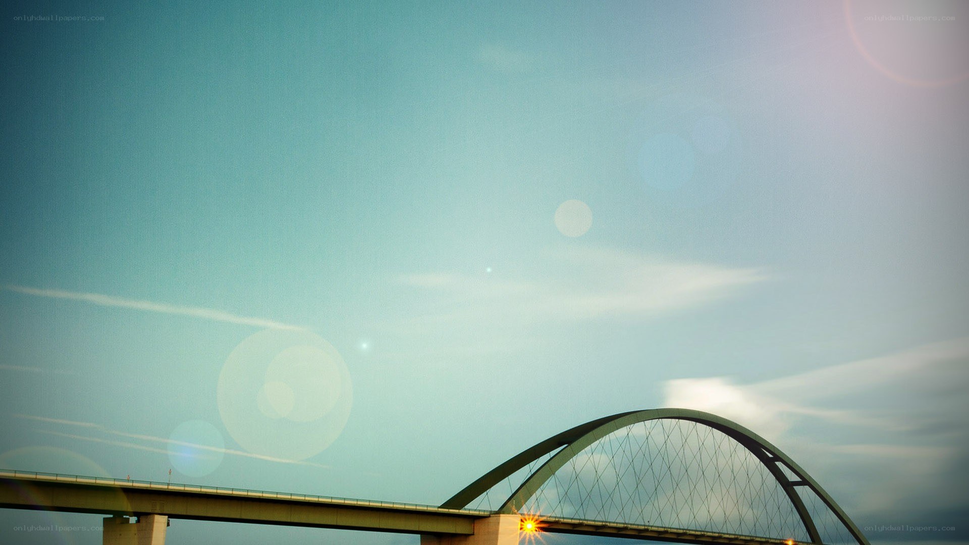 Bridge arch against sky