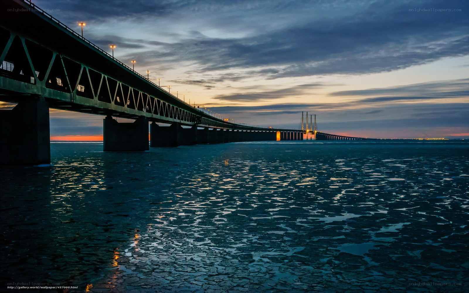 Bridge at dusk over icy water
