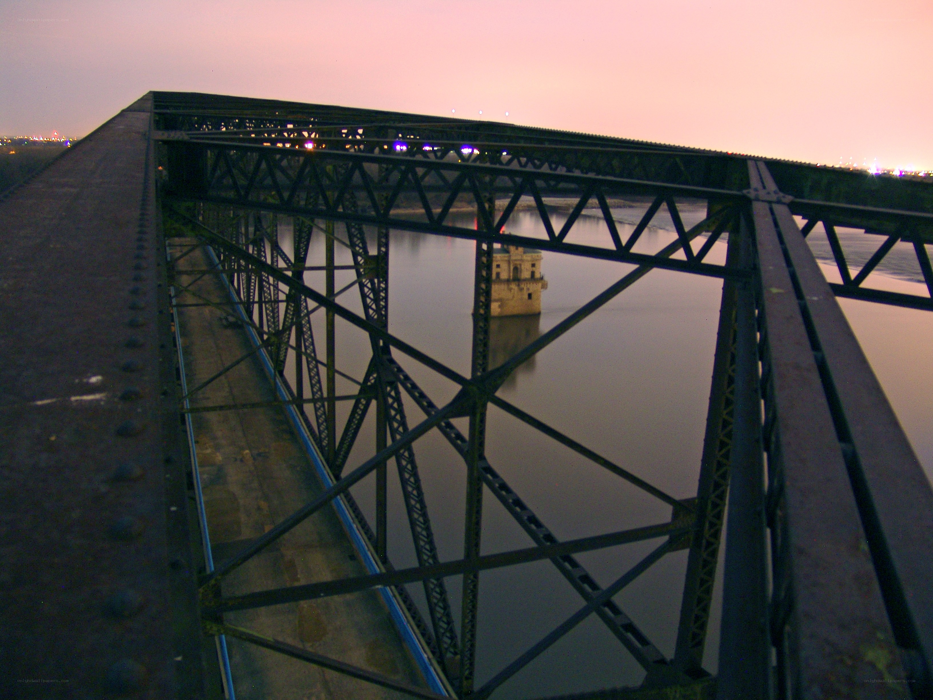 Bridge at dusk over river