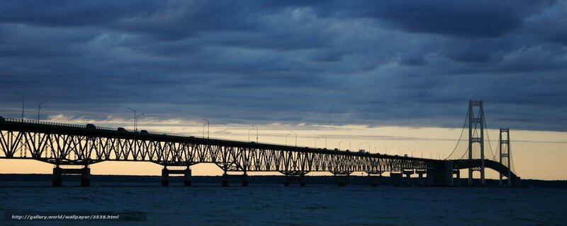 Bridge at dusk with cloudy sky