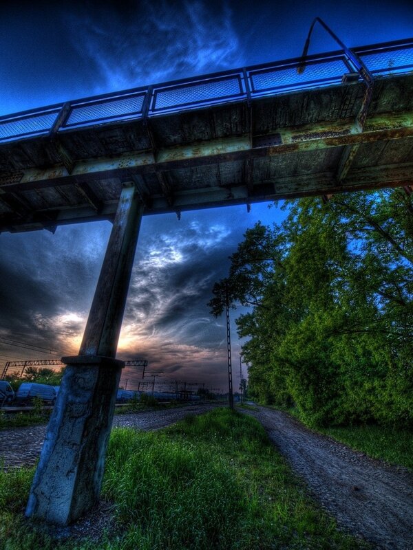 Bridge at dusk with dramatic sky