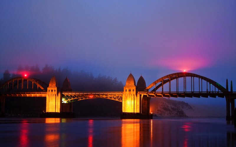 Bridge at dusk with fog