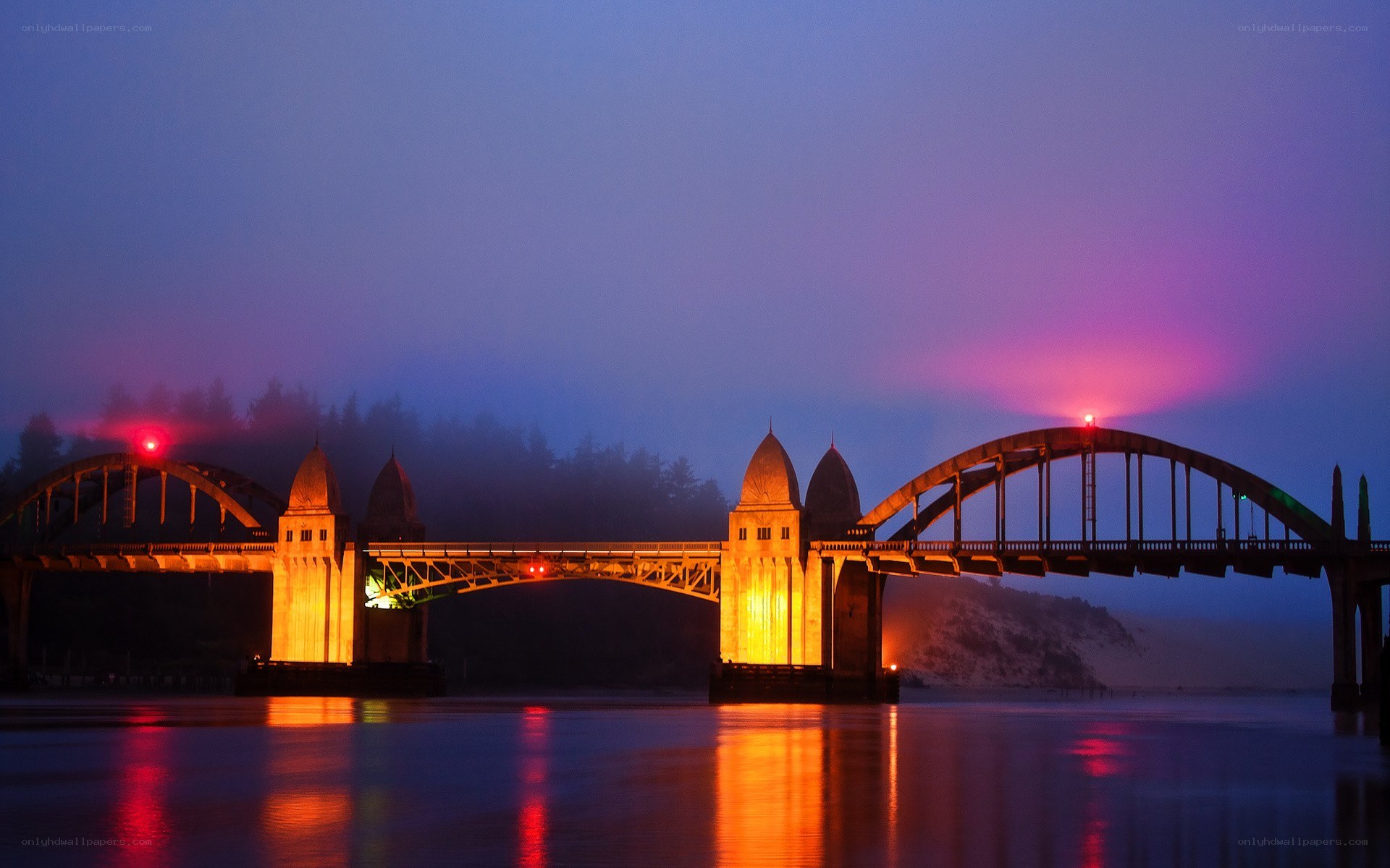 Bridge at dusk with fog