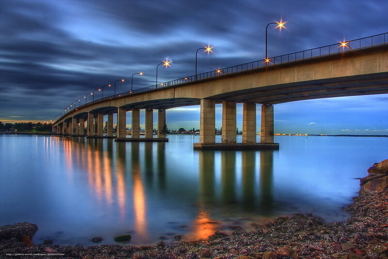 Bridge at dusk with light reflections