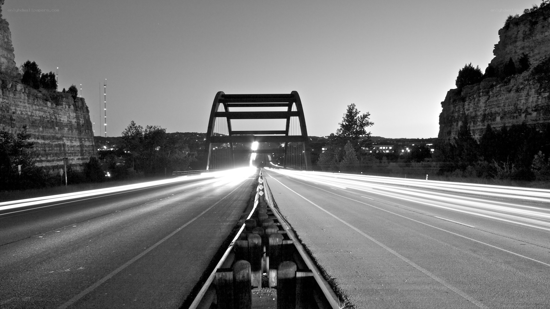 Bridge at dusk with light trails