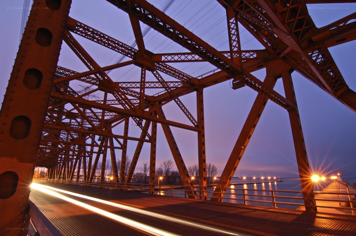 Bridge at dusk with light trails