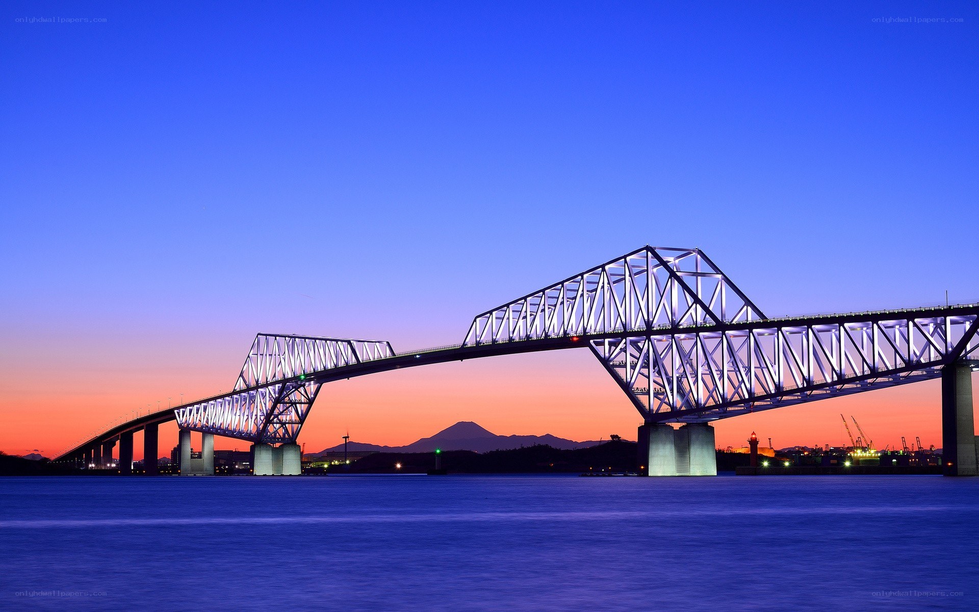 Bridge at dusk with mountain view