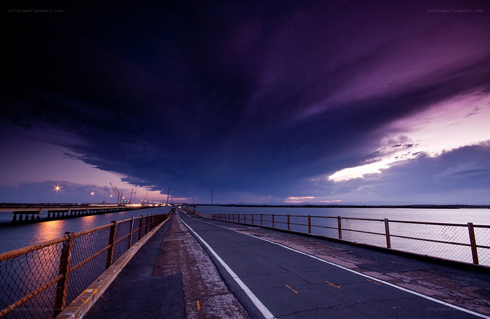Bridge at dusk with purple sky