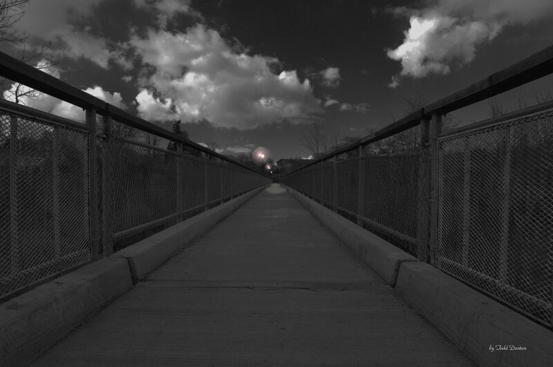 Bridge at night with clouds