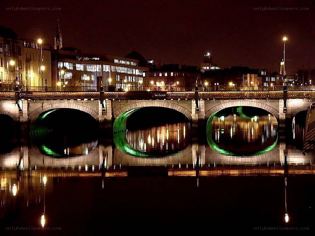 Bridge at night with green lights