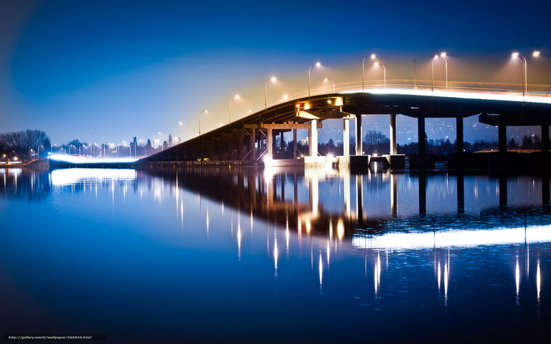 Bridge at night with light reflections