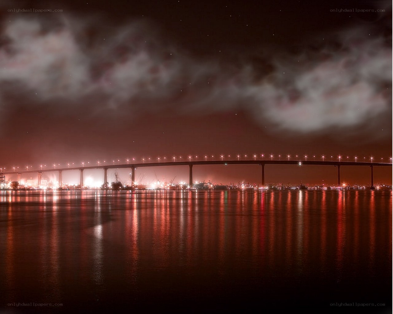 Bridge at night with red lights