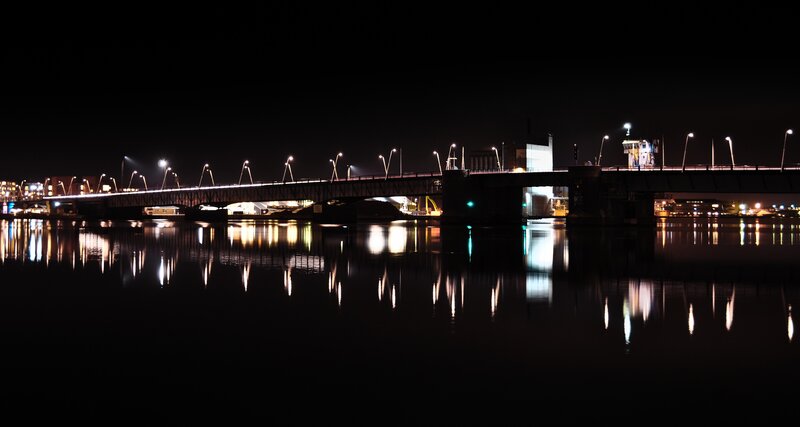 Bridge at night with reflections