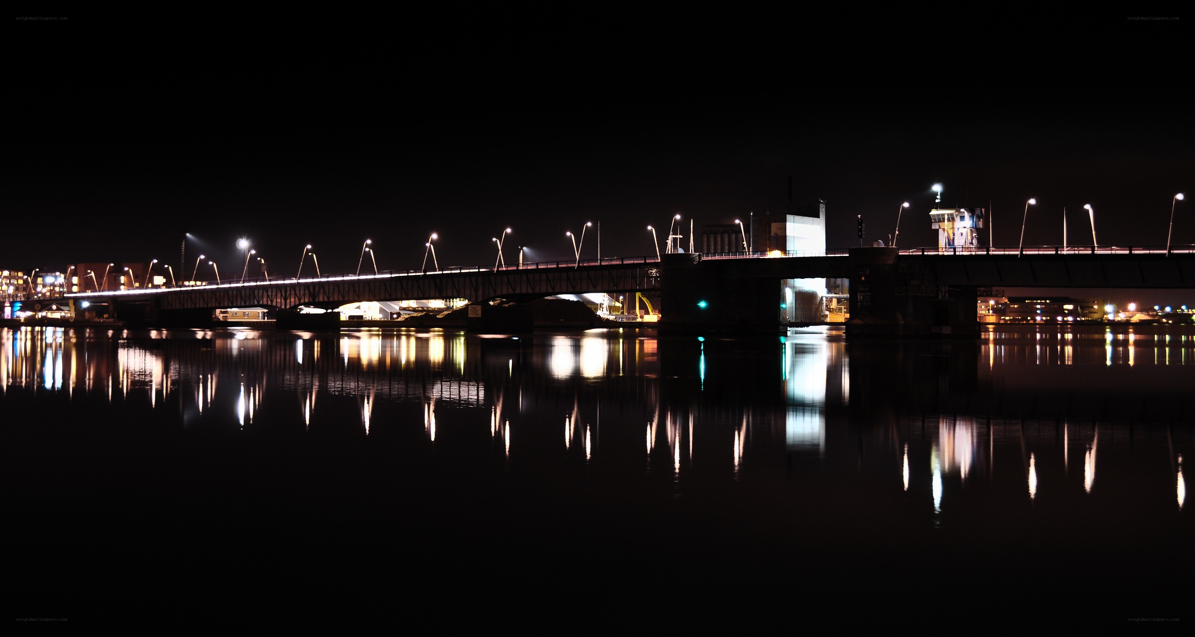 Bridge at night with reflections