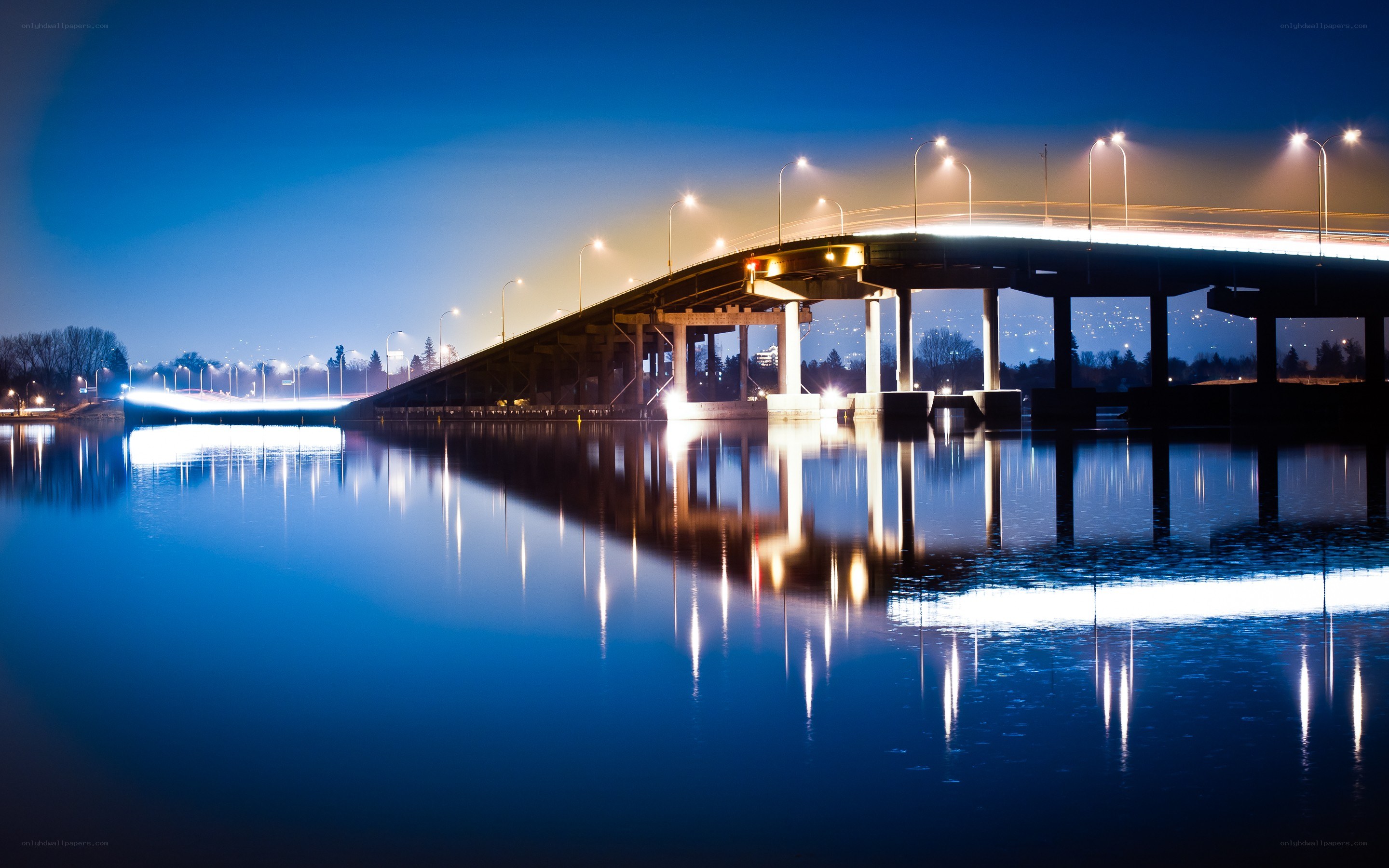 Bridge at night with reflections