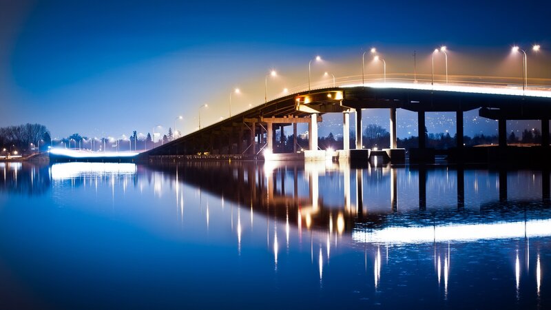 Bridge at night with reflections