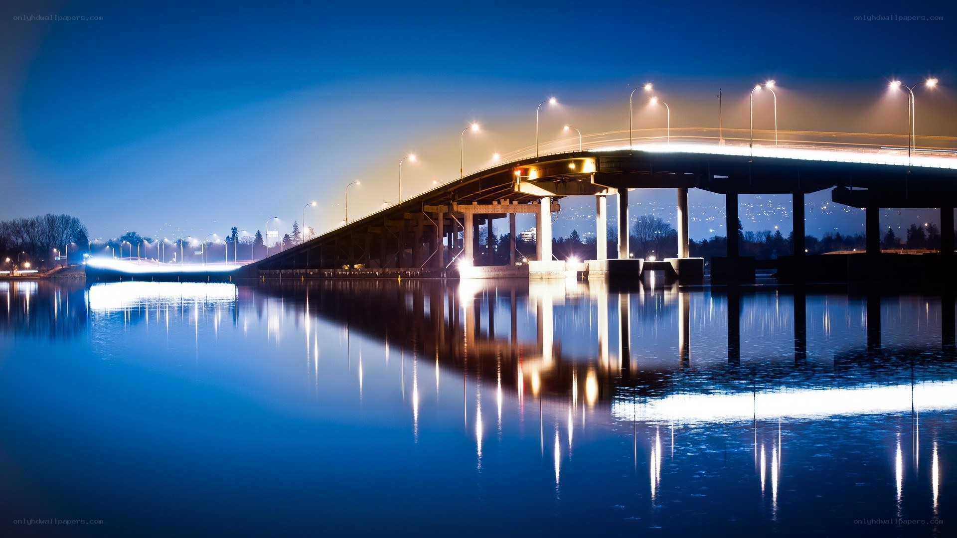 Bridge at night with reflections