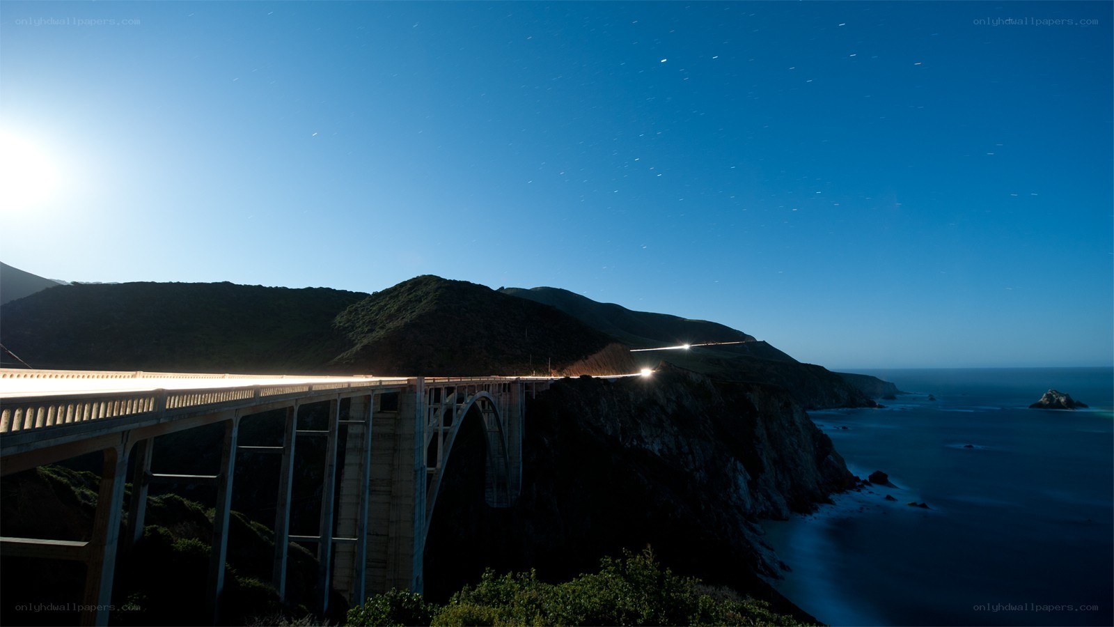 Bridge at night with starry sky
