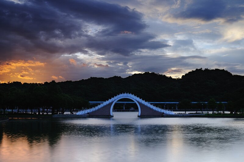 Bridge at sunset over lake