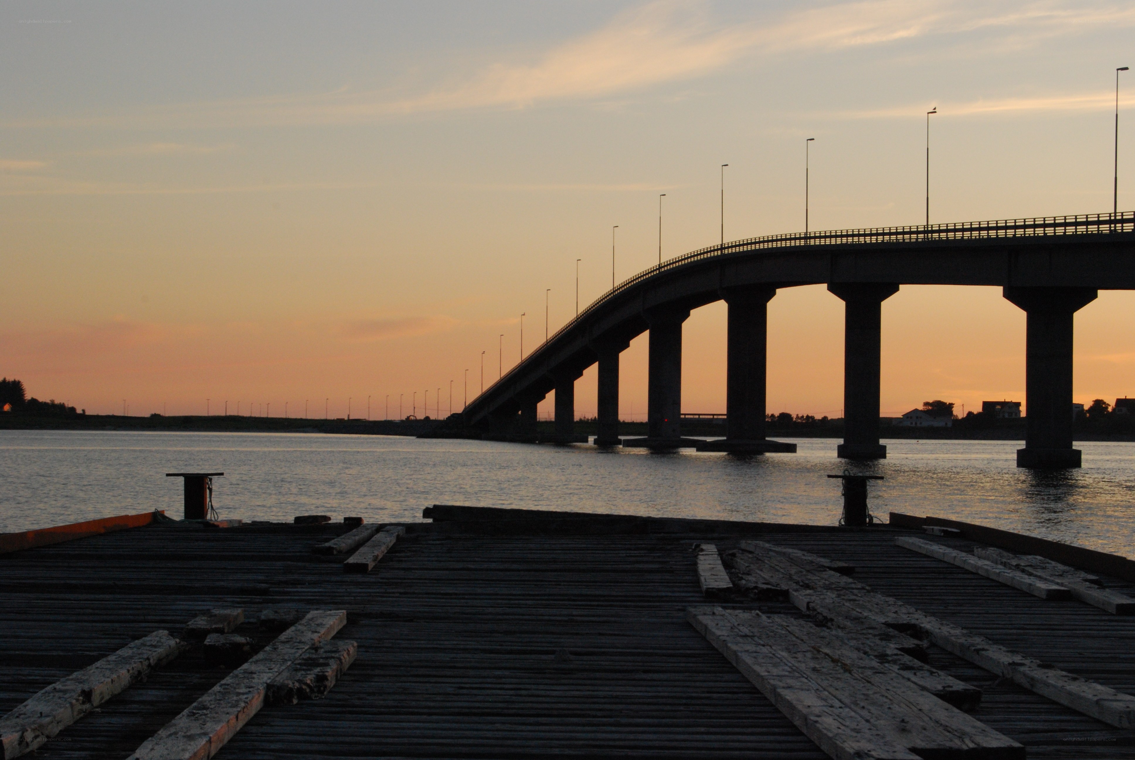 Bridge at sunset over water