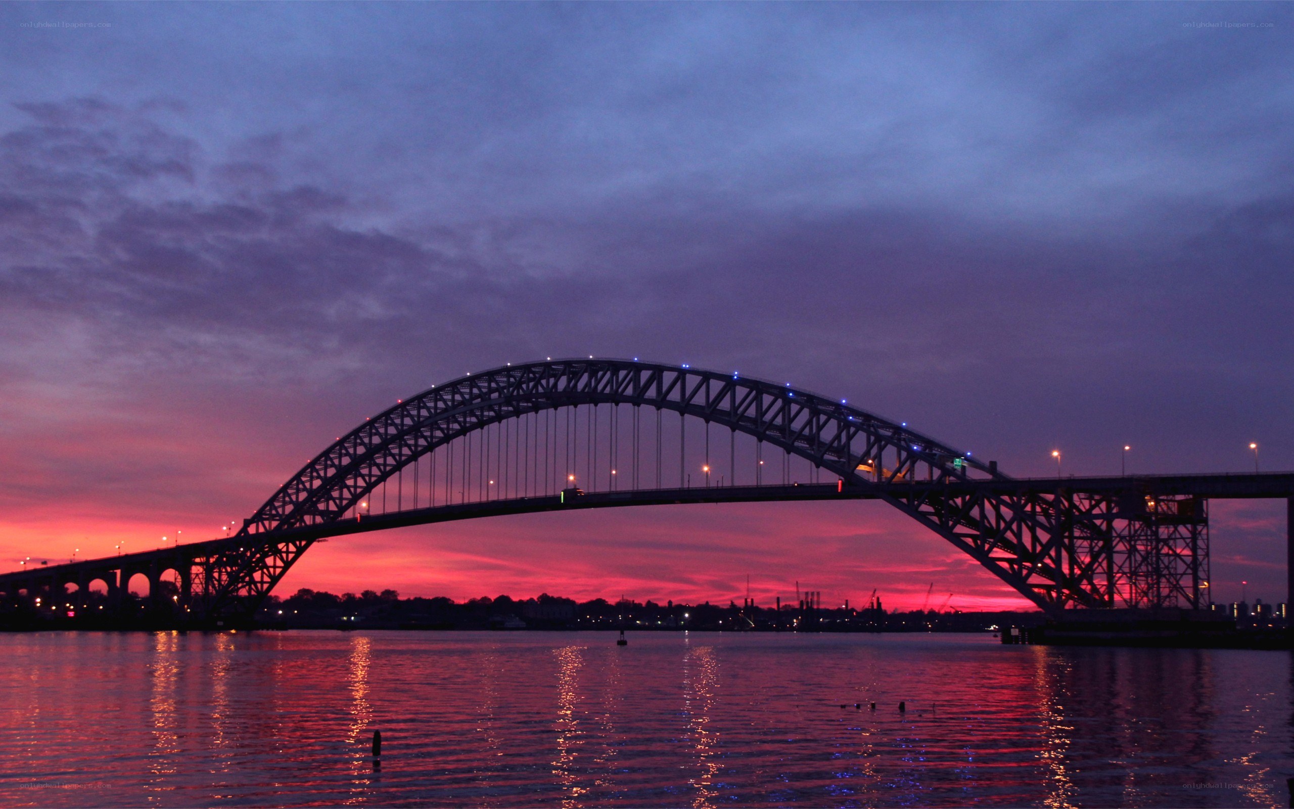Bridge at sunset over water