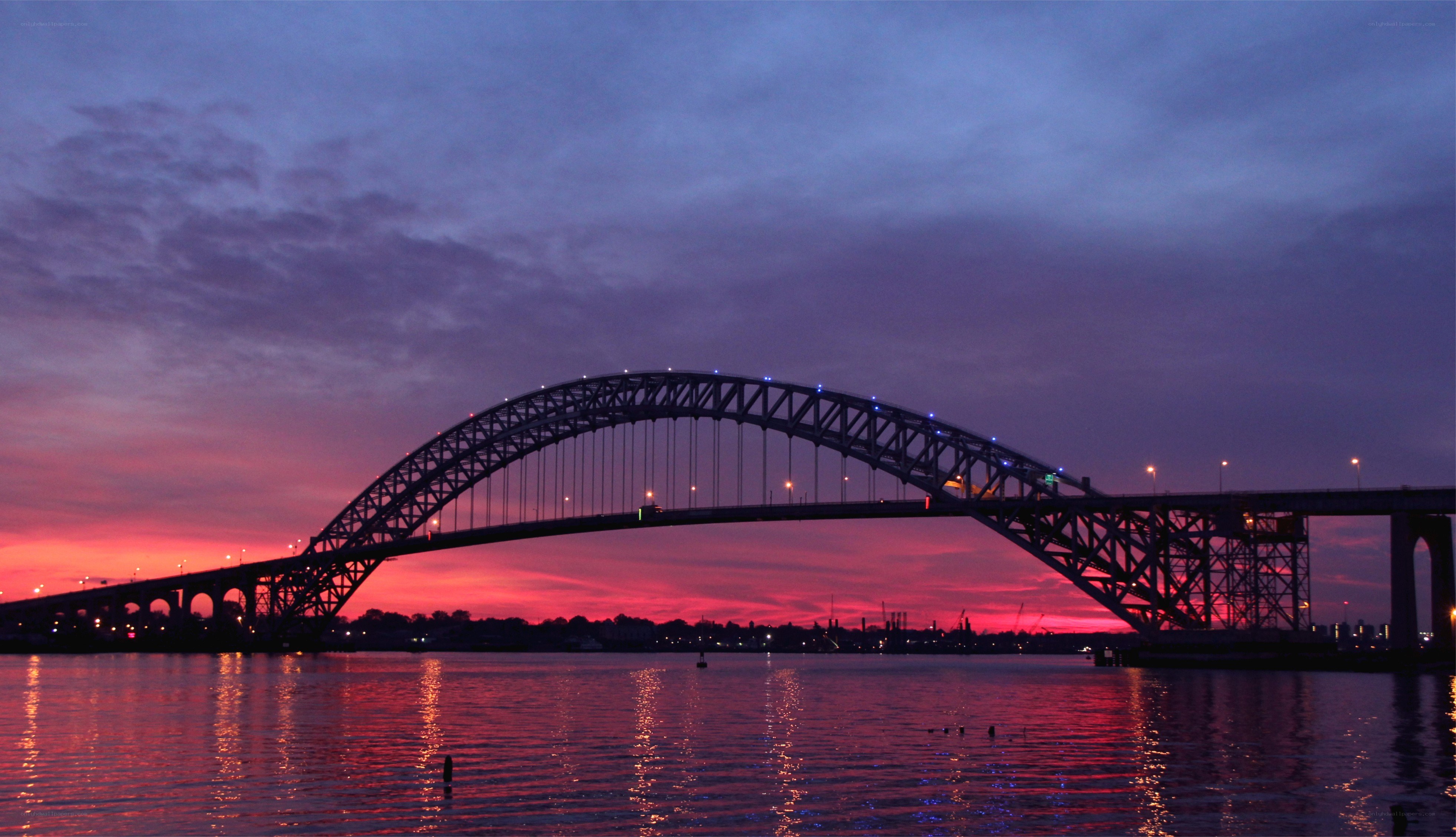 Bridge at sunset over water