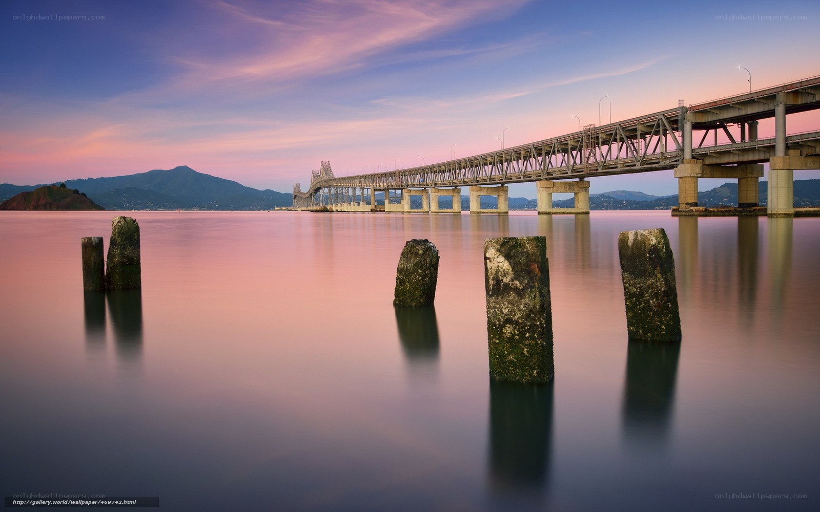 Bridge at sunset with calm water
