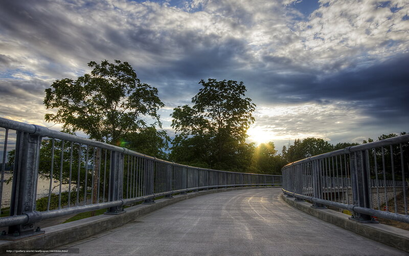 Bridge at sunset with cloudy sky