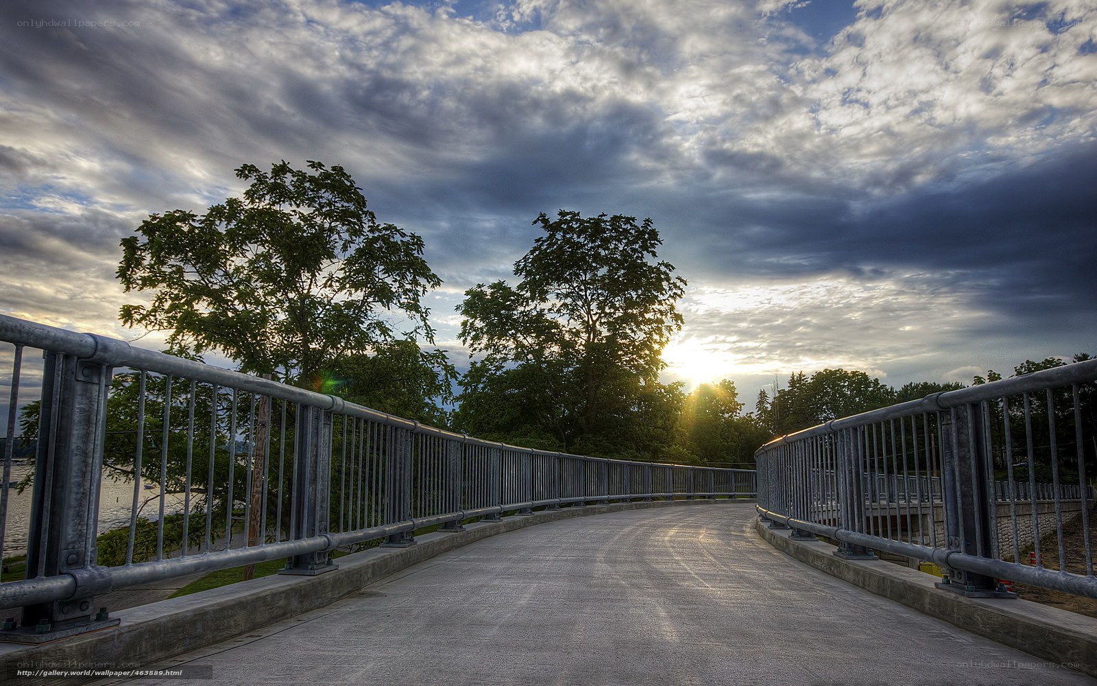 Bridge at sunset with cloudy sky