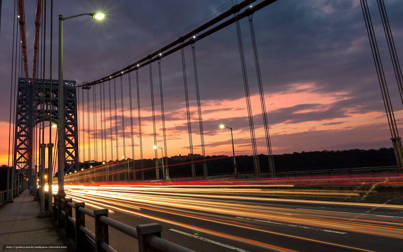 Bridge at sunset with light trails