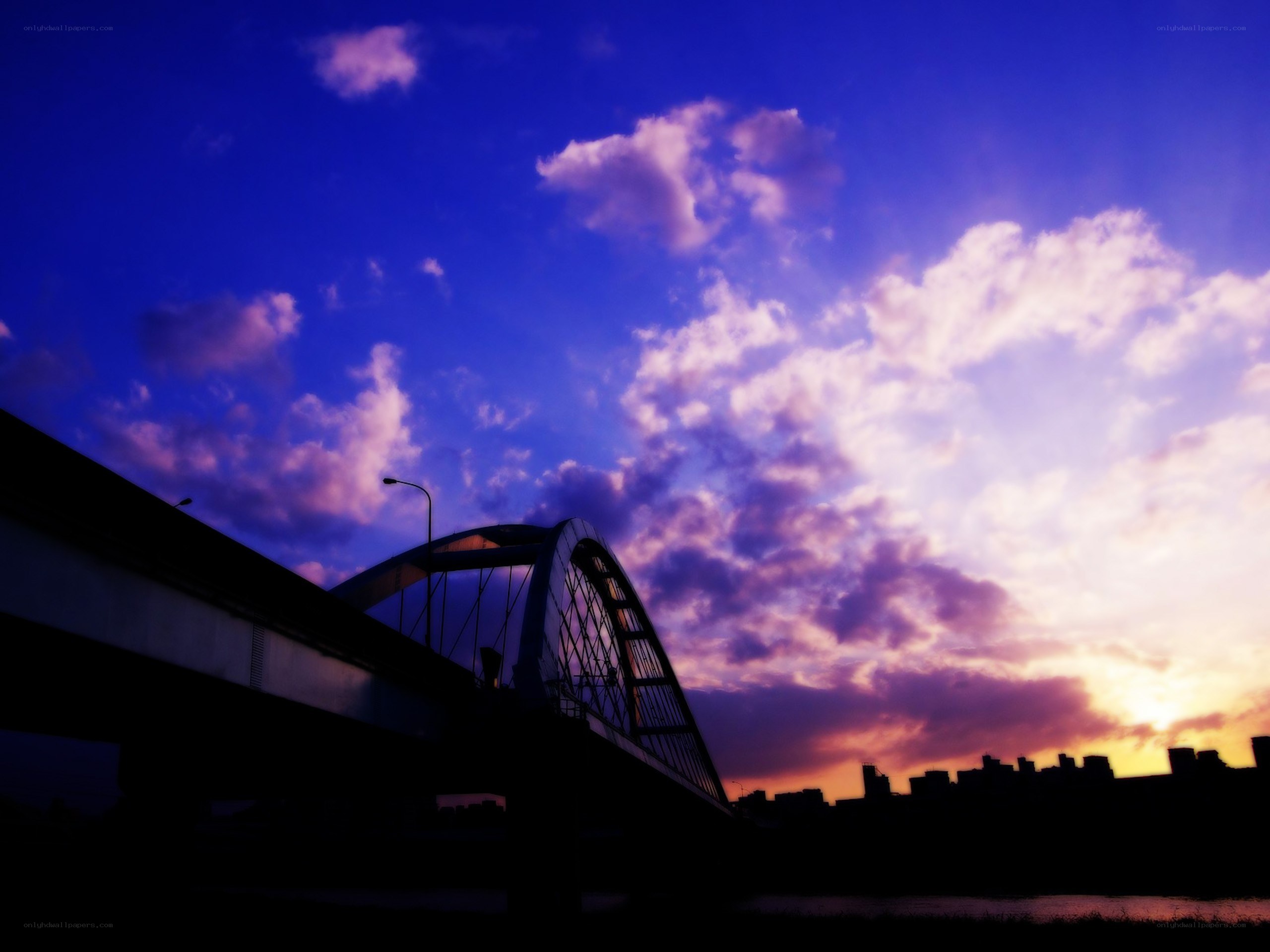Bridge at sunset with purple sky
