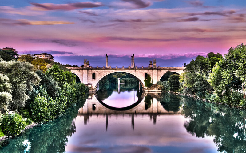 Bridge at sunset with reflection