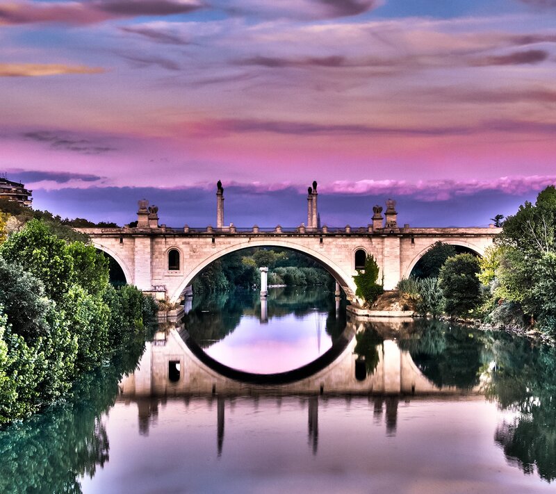 Bridge at sunset with reflection