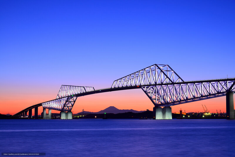Bridge at twilight with mountain view