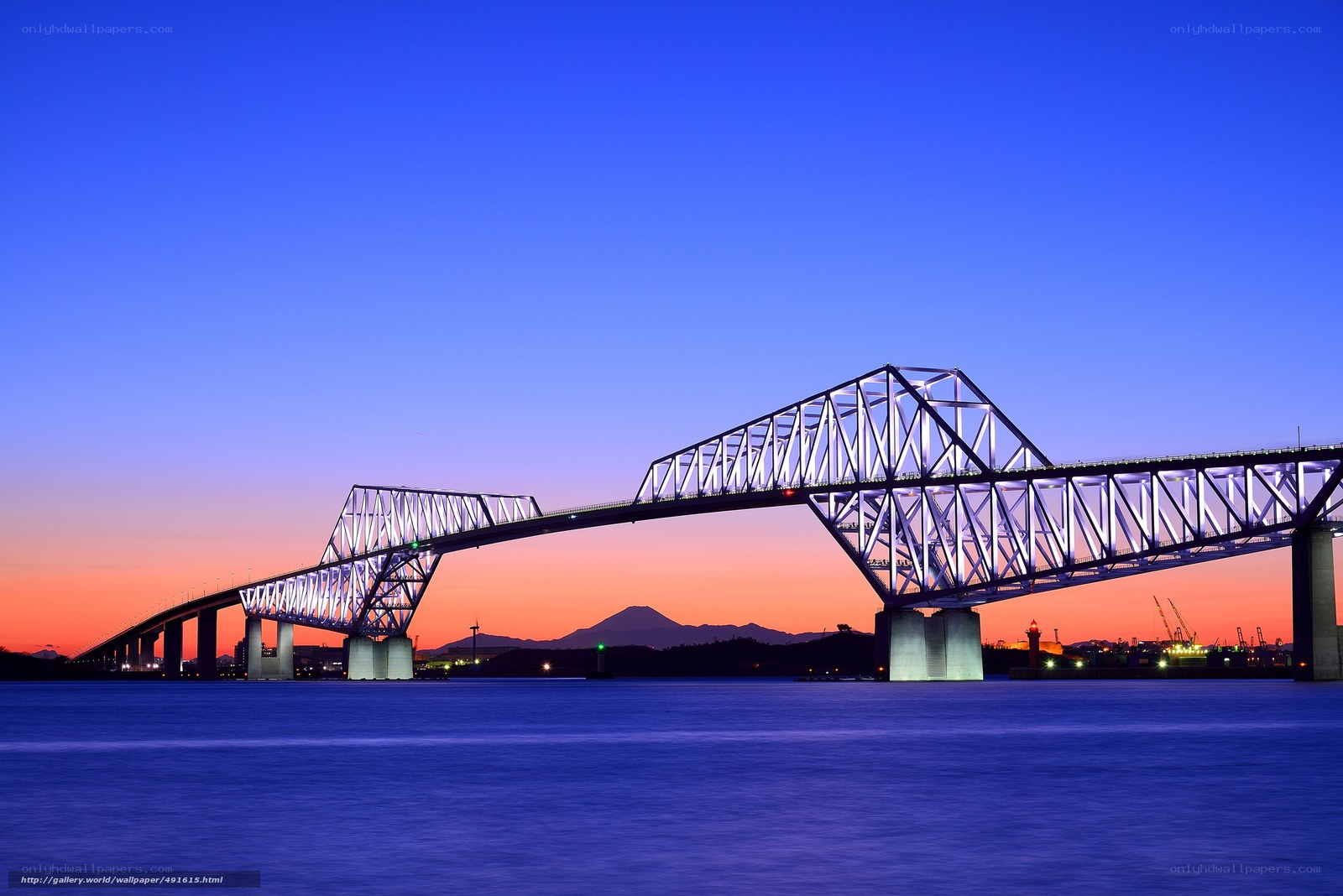Bridge at twilight with mountain view