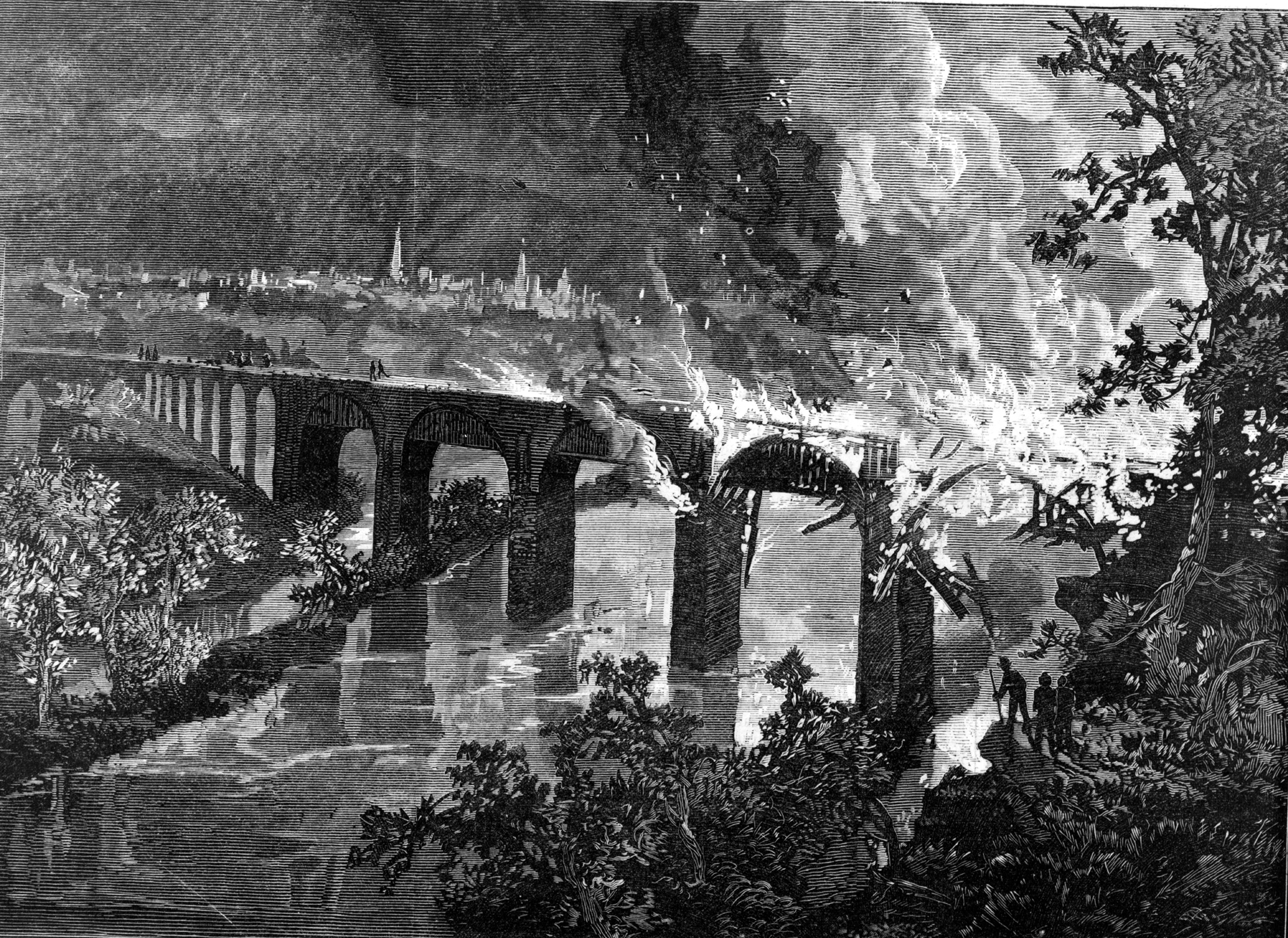 Bridge on fire during conflict