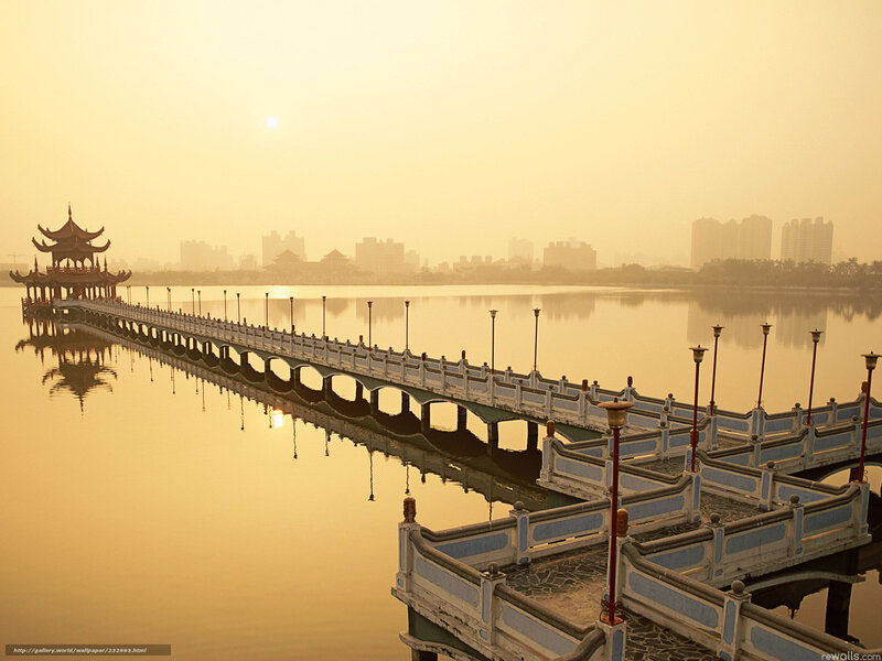 Bridge over a lake at sunrise