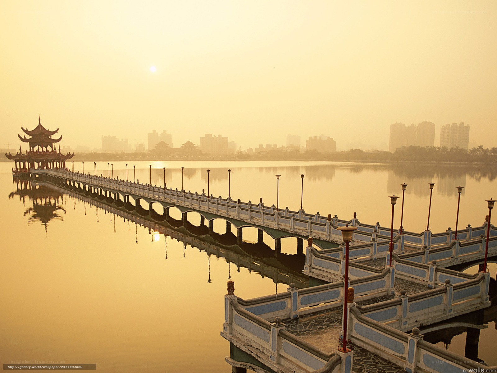 Bridge over a lake at sunrise