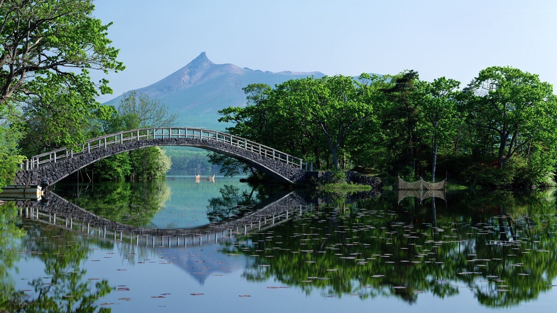 Bridge over a lake with mountain view