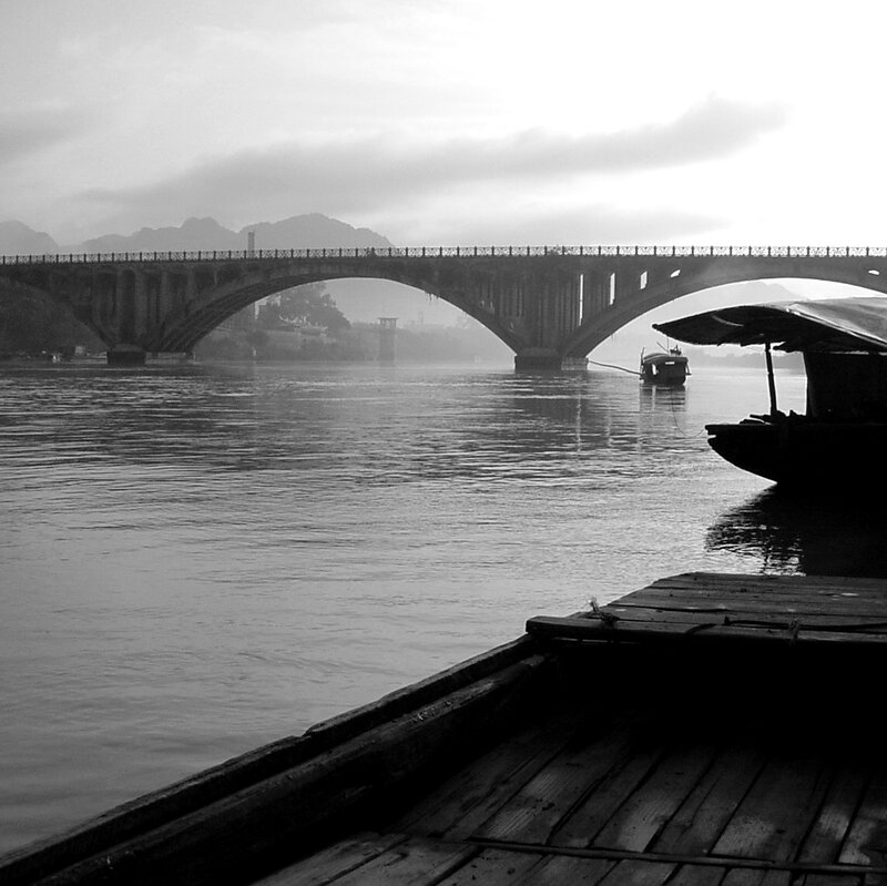 Bridge over a river at dawn