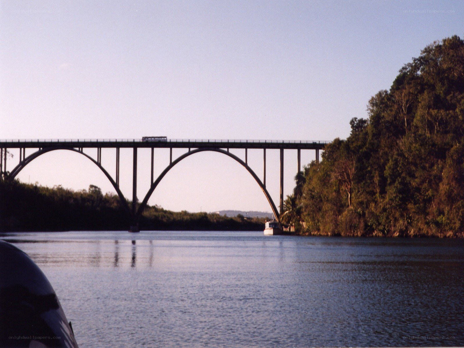 Bridge over a river at dusk