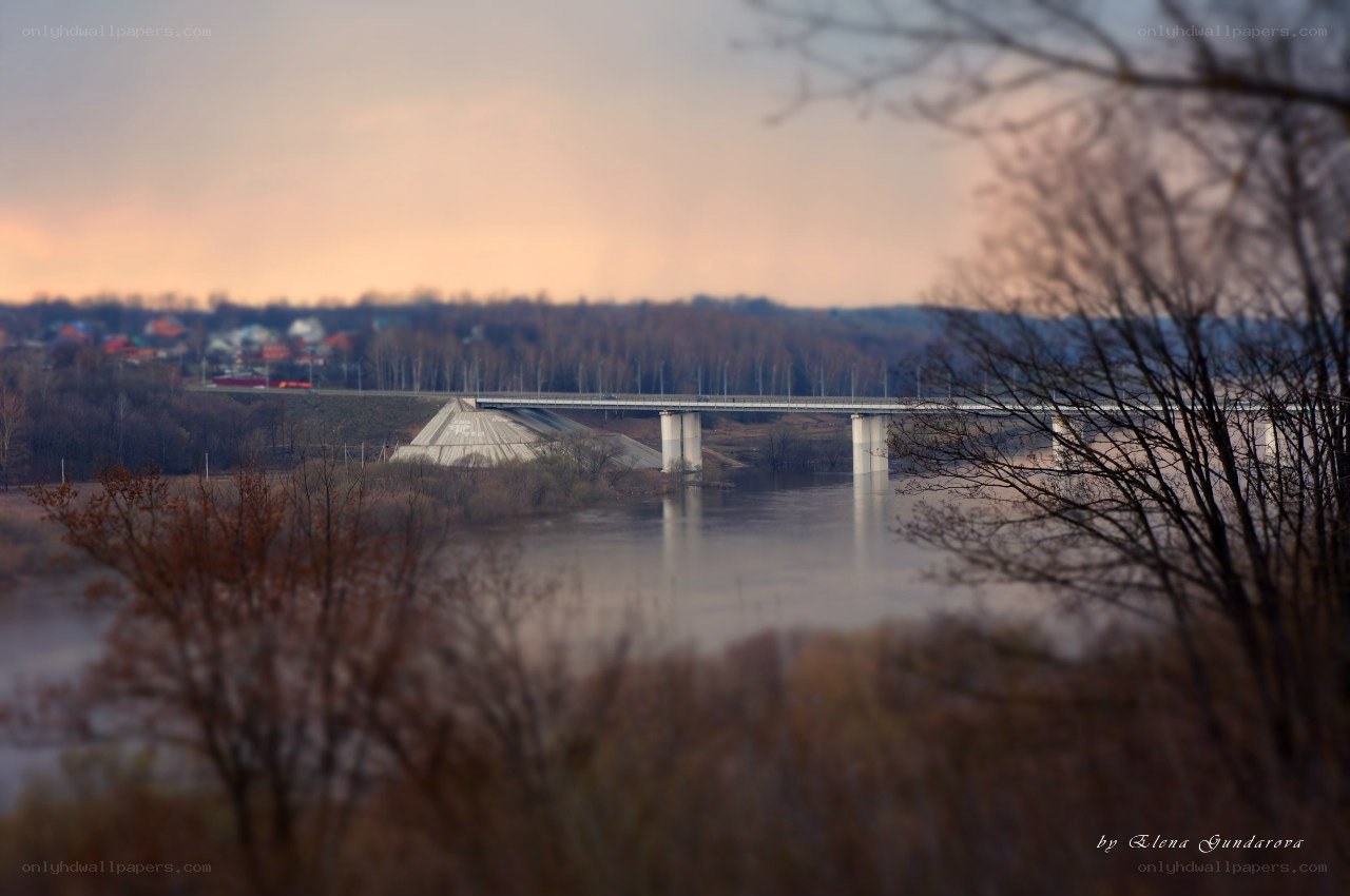 Bridge over a river at dusk