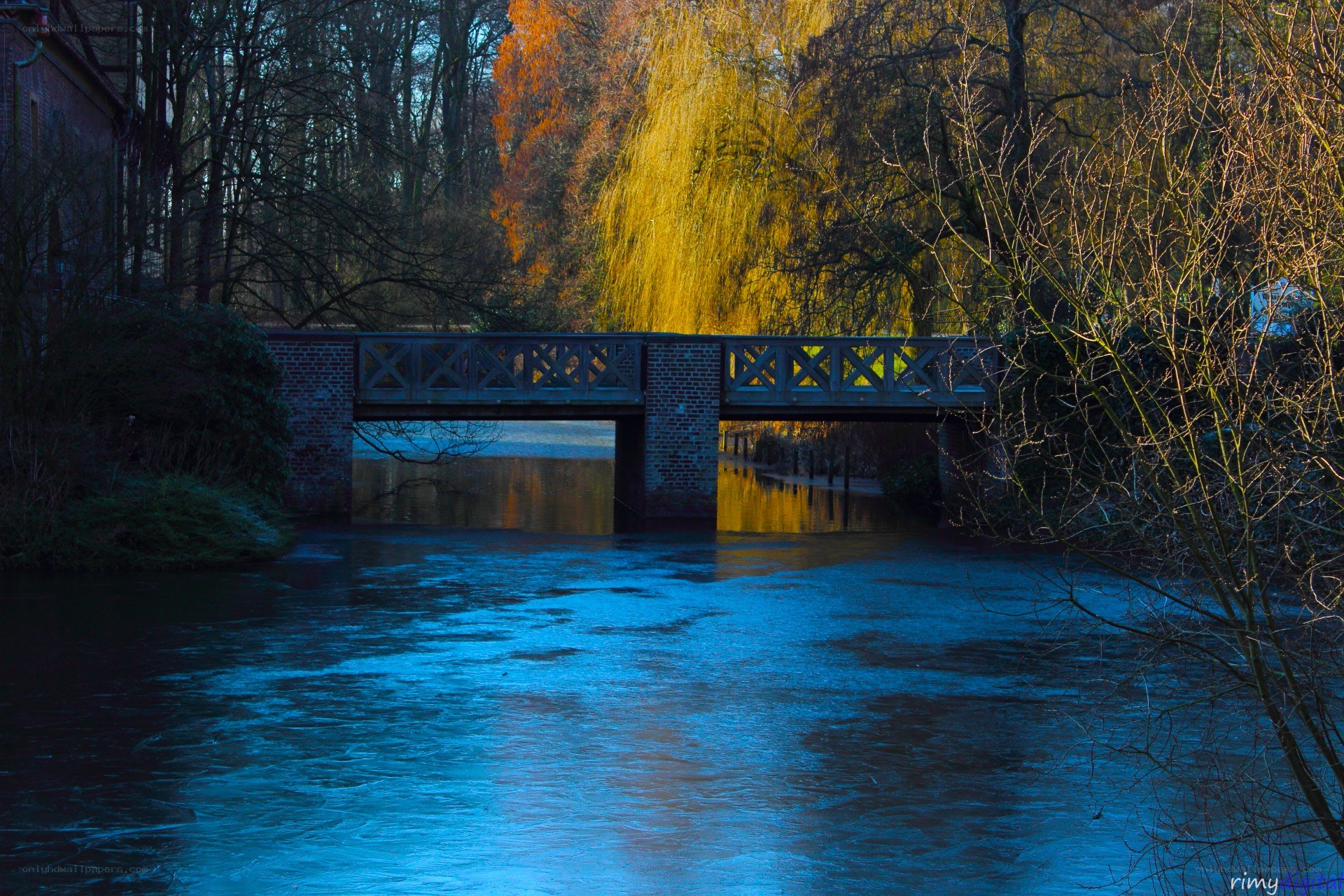 Bridge over a river at dusk