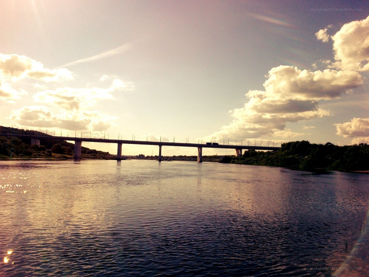 Bridge over a river at sunset