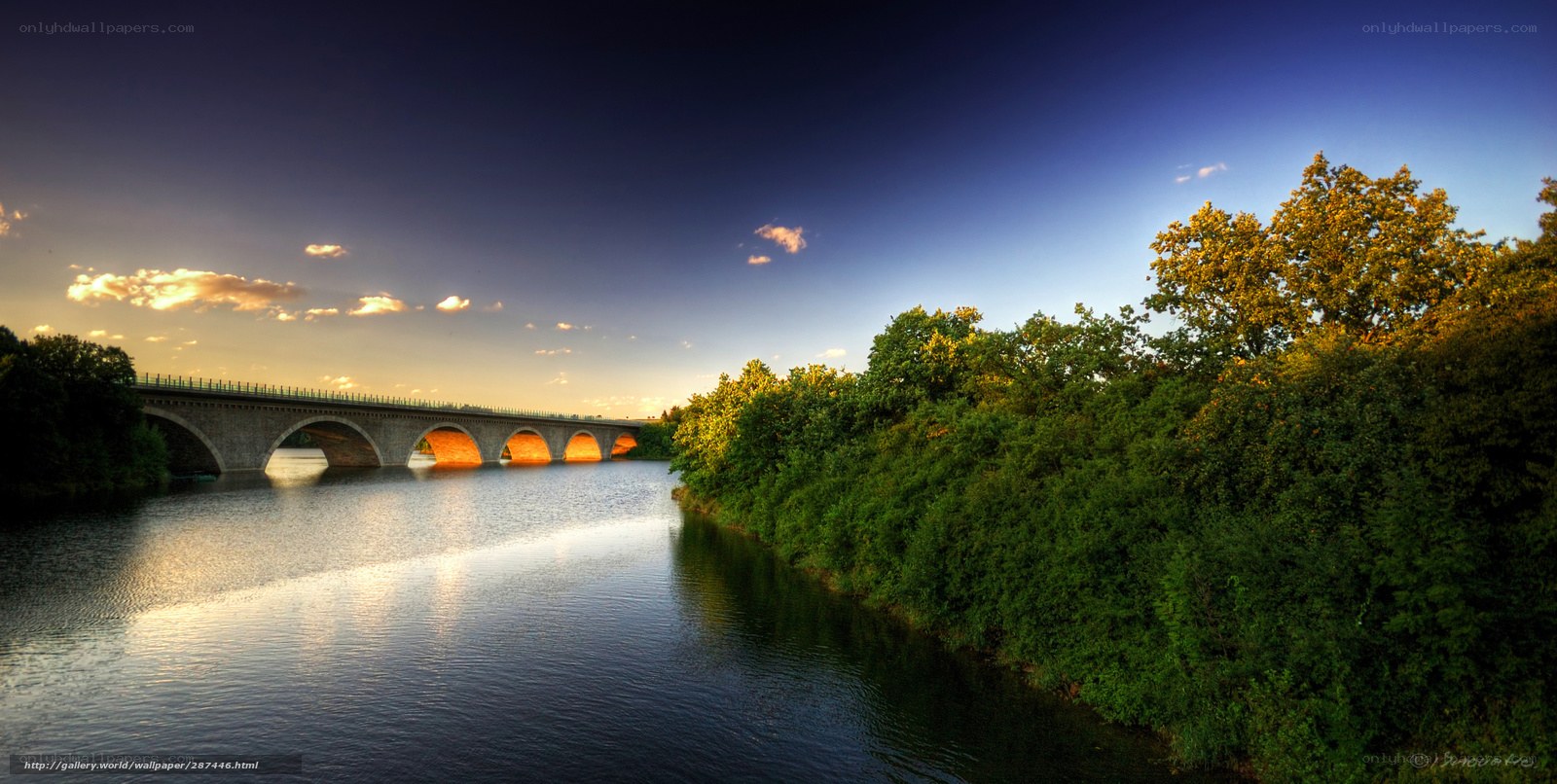 Bridge over a river at sunset