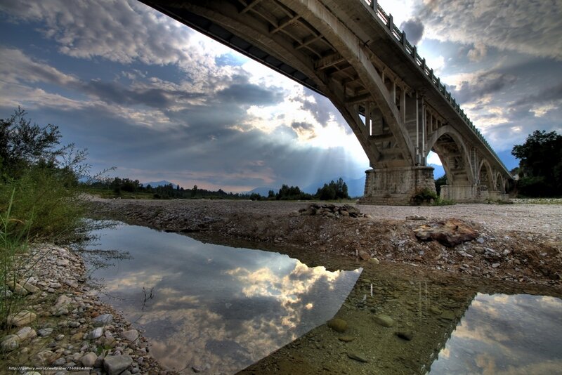 Bridge over a river at sunset